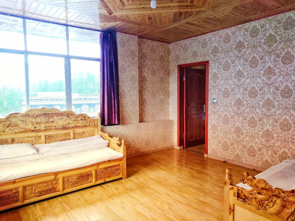 Zishuo Zihua Guest House Daocheng Exterior photo