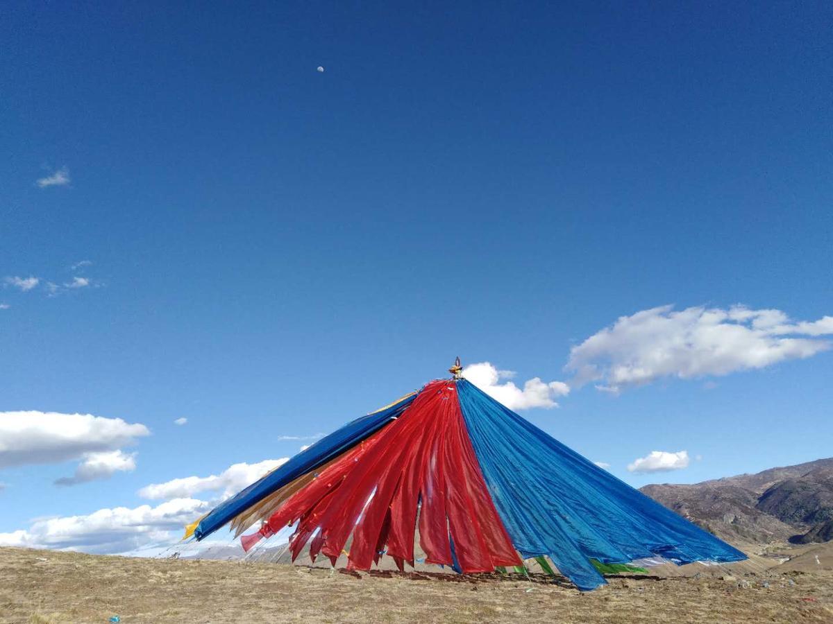 Zishuo Zihua Guest House Daocheng Exterior photo