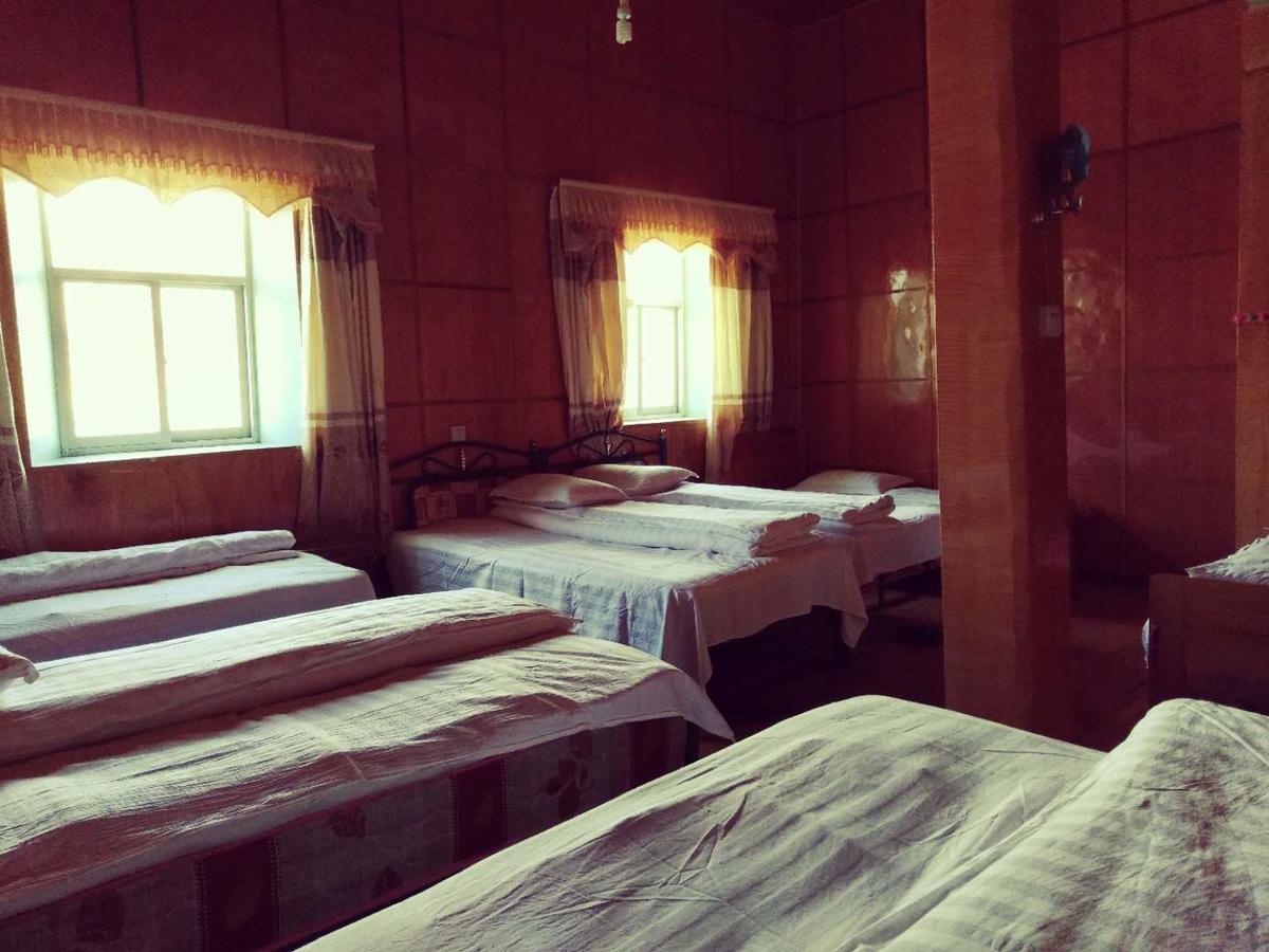 Zishuo Zihua Guest House Daocheng Exterior photo