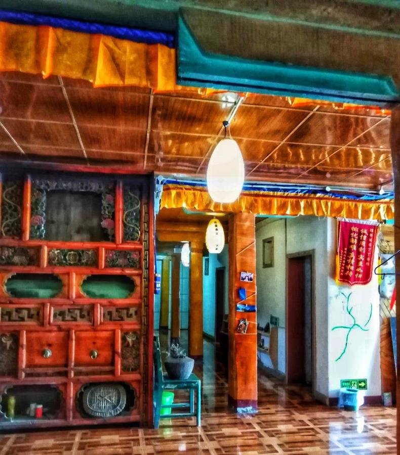 Zishuo Zihua Guest House Daocheng Exterior photo