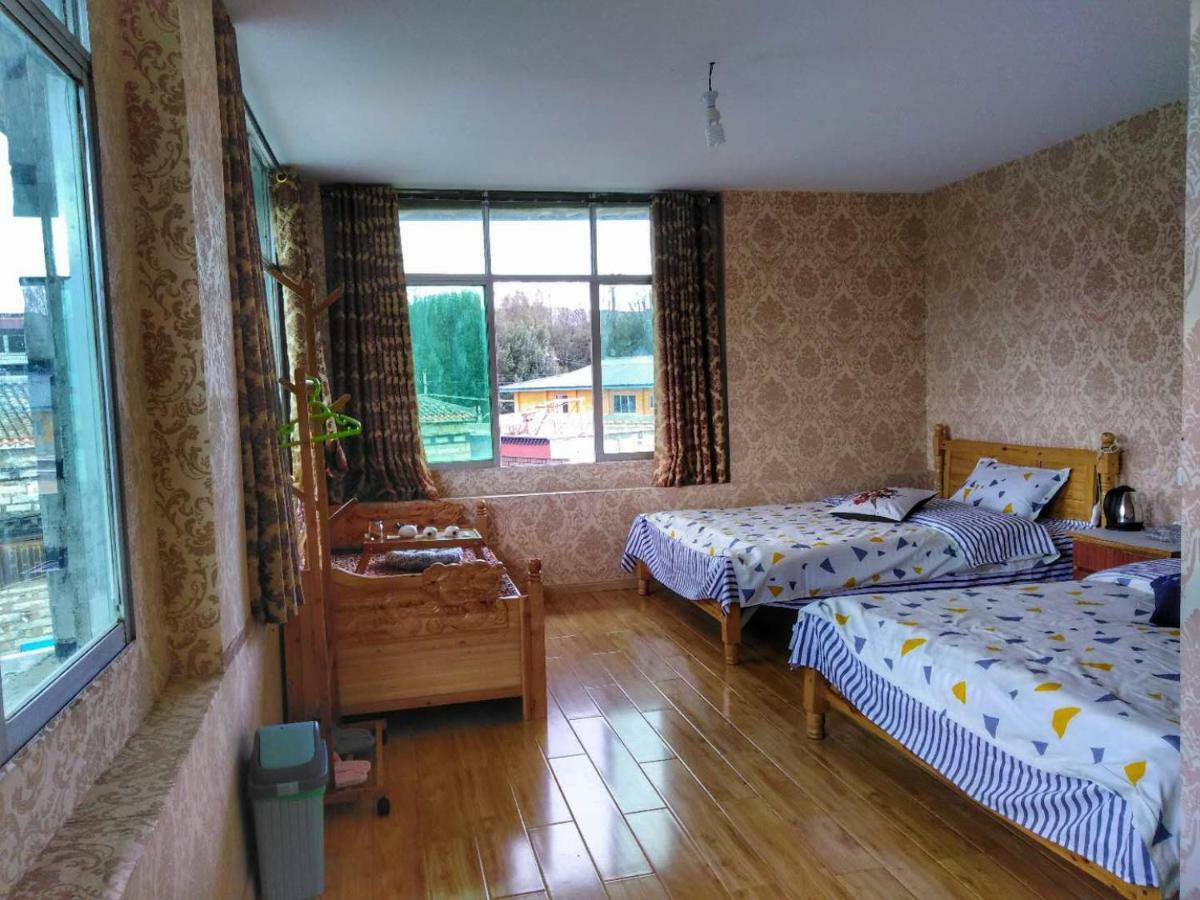 Zishuo Zihua Guest House Daocheng Exterior photo