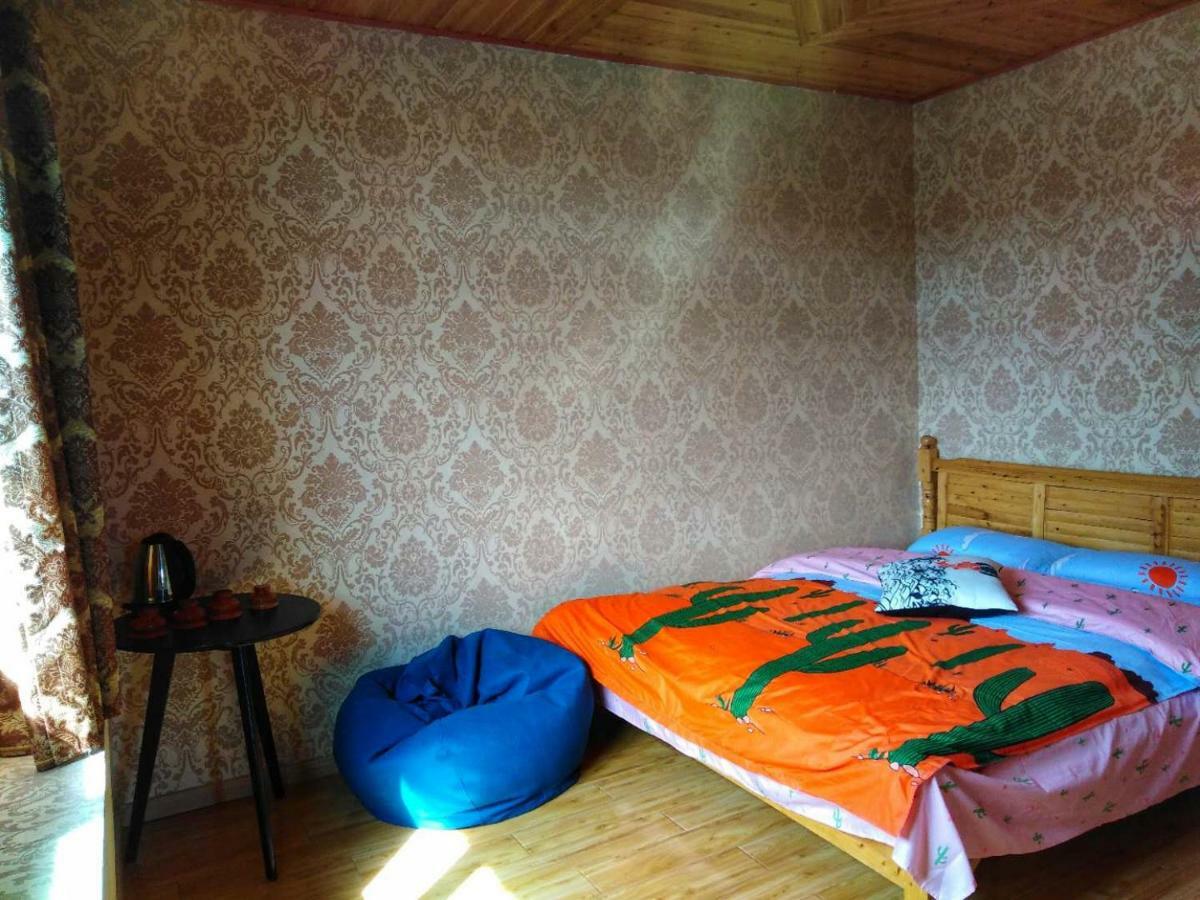 Zishuo Zihua Guest House Daocheng Exterior photo